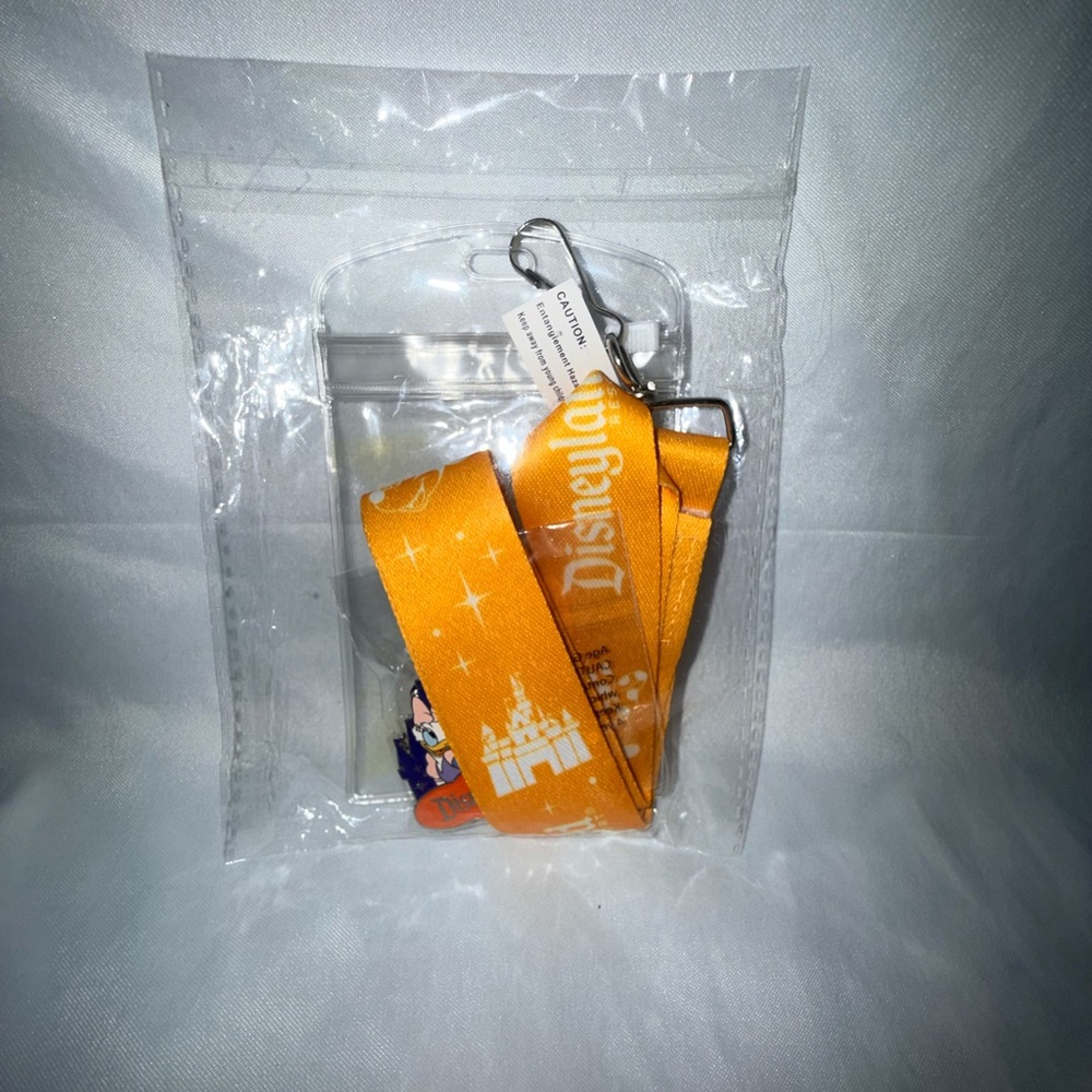 Disney Orange Printed Lanyard with Clear ID Sleeve and Clip